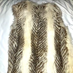 Vintage ( small boutique) fur vest. Rabbit fur. Large. Very good condition.